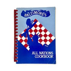 a cookbook with an image of a woman holding a checkered flag