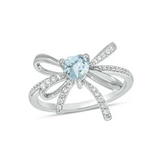 a white gold ring with an aqua topazte and diamonds