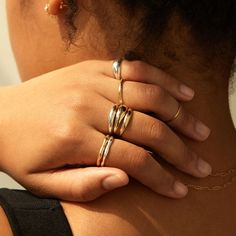 A young Black woman has her hair pulled up and holds her hand on the back of her neck. She wears chunky rings on each of her fingers. Catbird Jewelry, Dome Ring, Gold Ring Stack, Domed Ring, Fine Jewelry Collection, Recycled Gold, Engagement Ring Wedding Band, Gifts For Wedding Party, Ring Silver