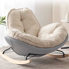 a rocking chair with a cushion on top of it