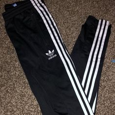 Brand New Adidas Track Pant White Bottoms With Three Stripes Branding For Spring, Fitted White Bottoms With Side Stripes, Fitted Adidas Bottoms With Side Stripes, White Stretch Adidas Sweatpants, White Stretch Bottoms With Three Stripes Branding, Fitted Casual Black And White Bottoms, Adidas White Streetwear Pants, Adidas Black Pants For Spring, Adidas Track Pants