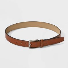 Whether you’re working in the office or lunching with friends, this Dress Belt from Goodfellow & Co™ adds the perfect finishing touch to your look. This dress belt is made from bonded leather for a comfortable and classic look. It also has a shiny silver buckle closure to complete the classy look and allows you to get a customized fit with multiple holes and loop. Pair with any of your pants to feel great all day. Goodfellow & Co™: Where style & fit are always in good company. Classic Fitted Belts For Fall, Brown Belt With Self Belt For Workwear, Casual Belts For Workwear In Spring, Classic Spring Formal Belt, Casual Belts For Spring Workwear, Casual Brown Belt For Workwear, Casual Spring Belts For Workwear, Casual Brown Belt For Work, Classic Formal Belts For Spring