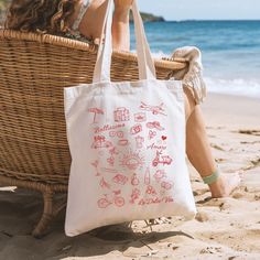 Prepare to fall in love with this La Dolce Vita cotton canvas reusable tote. Carefree coastal spirit vibes with a touch of glam. Embrace the effortless elegance of an Italian summer. Featuring Italian delights and the phrases, La Dolce Vita, Bellissimo and Amore in a timeless script, the design channels classic old money vibes. Picture golden sunsets along the Amalfi coast, where sophistication meets relaxed summer luxury.  ✻ Explore our shop for more unique finds!     https://jdaddiegoods.etsy. Aesthetic Tomato, Summer Old Money Aesthetic, Summer Old Money, Tomato Girl, Italian Bags, Coastal Granddaughter, Granddaughter Gift, Money Aesthetic, Downtown Girl