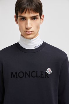 A casual staple, this sweatshirt is crafted from pure cotton fleece. The classic crew neck style for men is embellished with a felt logo patch on the chest, a distinct Moncler design code. Luxury Crew Neck Sweatshirt With Ribbed Cuffs, Luxury Crew Neck Sweater With Logo Detail, Logo Crew Neck Winter Sweatshirt, Winter Logo Crew Neck Sweatshirt, Luxury Crew Neck Sweatshirt For Winter, Luxury Crew Neck Winter Sweatshirt, Designer Crew Neck Sweatshirt With Logo, Designer Crew Neck Sweatshirt With Logo Detail, Luxury Crew Neck Sweater With Embroidered Logo