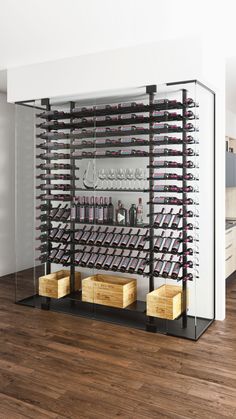 the wine rack is filled with many bottles