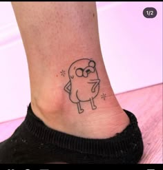 a small foot with a cartoon character on it's side and the words, don't touch me