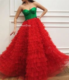 Details - Green and red color  - Designer tulle fabric  - Handmade corset  - Ball gown style with waist definition - For special occasions Corset Ball Gowns, Handmade Corset, Teuta Matoshi, Gown Style, Tulle Fabric, Green And Red, Christmas Dress, Fancy Dresses, Ball Gown