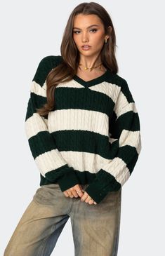 Stay relaxed to the max in this cozy Edikted Oversized Striped Cable Knit Sweater. Throw it over any outfit for the perfect chilled vibe.SweaterOversized fitV necklineStriped patternCable knit fabricAcrylicModel wears size SModel height is 5'8Item care: Machine wash at maximum 30C, do not bleach, do not tumble dry, iron at a maximum of 110C, do not dry clean. Edikted Womens Oversized Striped Cable Knit Sweater - Green size Large Cable Stitch Knit, Oversized Cable Knit Sweater, Cozy Oversized Sweaters, Wwe T Shirts, Cable Knit Sweater Womens, 2024 Outfits, Sweater Oversized, Sweater Oversize, Designer Clothes For Men