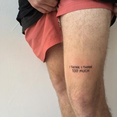 a man's legs with the words think i think too much written on it