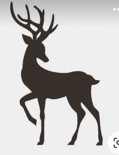 the silhouette of a deer with antlers on it's back is shown in black and white