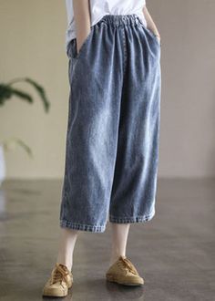 Baggy Light Blue Elastic Waist Pockets Denim Cotton Wide Leg Pants SummerFabric: CottonSize Fit: This garment fits true to size.Length: Size 3XL measures 31.2"from waist to hem.Waist:Fitted - very fitted at natural waist Hip: Loosely Fitted. room for hips. Hand Wash Cold. Spring Baggy Blue Cropped Jeans, Spring Blue Baggy Cropped Jeans, Casual Blue Washed Cropped Jeans, Denim Blue Cropped Jeans With Pockets, Non-stretch Denim Blue Bottoms With Pockets, Relaxed Fit Cropped Jeans In Dark Wash With Pockets, Relaxed Fit Dark Wash Cropped Jeans With Pockets, Denim Blue Non-stretch Cropped Jeans, Dark Wash Cropped Jeans With Relaxed Fit