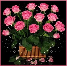 pink roses are arranged in a vase on a black background with white pearls and green leaves