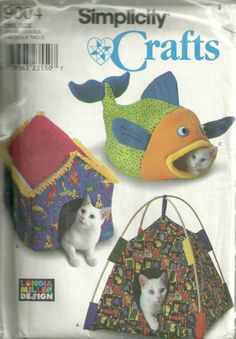 the sewing pattern for this cat house has two cats in it