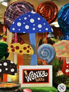 there are many colorful mushrooms on display in the store