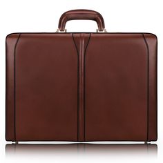 A tribute to the classic briefcase with modern improvements. Find comfort in the well-designed handle. Be secure with the 3-digit locks. Organization is easy with a place for everything, including electronics. And importantly, when extra room is needed, expand the briefcase an extra inch. Features: Full Grain Leather 18.25” x 5.0” x 13.25” and 5.7lbs 3-digit combination lock Gold finish hardware Business organizer File divider Tablet pocket Protective feet Expandable Style #8048 Lawyer Bag, Urban Bags, Tom Daley, Leather Laptop Bag, Leather Laptop, Business Bag, Comfortable Tops, Leather Briefcase, Nice Leather