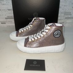 Versace La Greca Glitter High-Top Sneakers Size 38 Metallic Glitter Lace-up Sneakers, Metallic Low-top Sneakers With Speckled Midsole, White High-top Sneakers With Glitter Accents, Metallic High-top Sneakers With Speckled Midsole, Designer Metallic Low-top Sneakers, Metallic Low-top Sneakers With Glitter Accents, Glitter Accents Sneakers For Streetwear With Round Toe, Sporty Glitter High-top Sneakers With Round Toe, Glitter Accent Sneakers For Streetwear With Round Toe