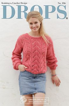 a woman in a pink sweater and denim skirt on the cover of drops knitting magazine