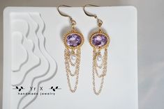 ♢ FEATURES & MATERIALS ~Pearl : white freshwater pearl,natural color,Origin China,4mm ~Amethyst:natural colour,Origin Brazil,8*10mm,6ct ~Materials: 14K Gold Filled These earrings look absolutely beautiful and timeless . Very romantic crystal bridal earrings. Gorgeous long earrings for your special day! It is 100% handmade jewelry ,each piece is one of kind and crafted with love! All of our products are made of 14K Gold filled from the United States, which is hypoallergenic and can keep luster fo Amethyst Chandelier, Dangling Pearl Earrings, Crystal Bridal Earrings, Earrings Art, White Freshwater Pearl, Art Deco Earrings, February Birthstone, Amethyst Earrings, February Birth Stone