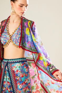 Multicolor draped jacket with floral pattern and geometric panel. Paired with beaded hem bralette and dhoti pant.
Components: 3
Type Of Work: Floral
Neckline: Open
Sleeve Type: Full
Fabric: Silk
Color: Multi Color
Other Details: 
Floral and geometric pattern
Occasion: Resort - Aza Fashions Rajdeep Ranawat, Draped Jacket, Pattern Jacket, Dhoti Pants, Drape Jacket, Open Sleeve, Fashion App, Fabric Silk, Jacket Pattern