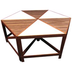 a wooden table with two white squares on top