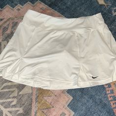 Nwot Nike Skirt With Built In Shorts Nike Lined Skirt For Spring, White Skirt Bottoms With Built-in Shorts, Nike Casual Short Tennis Skirt, Nike Casual Tennis Skirt, Nike Short Lined Skirt, Nike Sporty White Skirt, Nike Casual Short Skirt, Casual Nike Tennis Skirt With Lining, Casual Short Nike Skirt