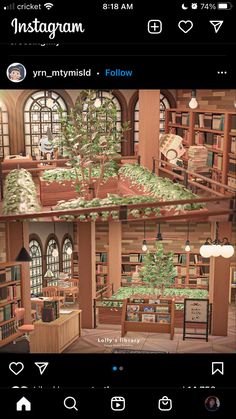 an image of a room with many bookshelves and trees in it on the phone screen