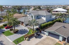 this is an aerial view of a home in the florida keys with lots of palm trees