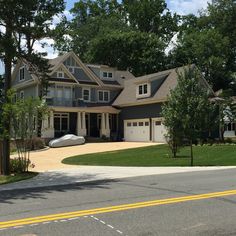 a large house with lots of windows on the front