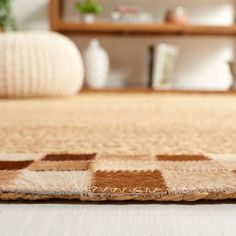 a close up view of a rug on the floor