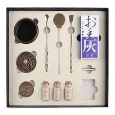 an assortment of items displayed in a shadow box