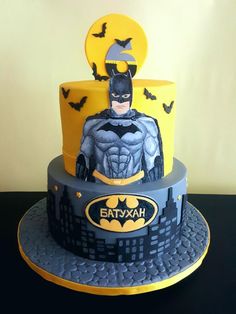 a batman themed birthday cake on a table