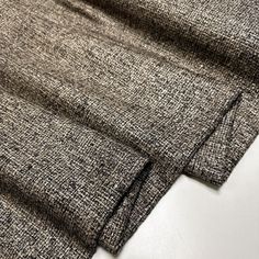 Indulge in the luxurious feel of our exclusive Italian wool tweed bouclé fabric by the yard. This high-quality grey tweed, blended with alpaca, is perfect for creating elegant winter coats, tailored jackets, and sophisticated Christmas gifts. The timeless texture and warmth of this designer fabric make it an ideal choice for stylish, long-lasting garments. Elevate your sewing projects with this exquisite tweed fabric, designed for those who seek the finest materials. ⚠️ PAY ATTENTION TO OUR POLICY 👉 We do not accept exchanges and returns, as the fabric is cut to fit each order. 👉 The price is for one meter. To order several meters, please order the appropriate number of units in the cart. 👉 All fabrics are sent in running lengths. For example, if you order 3 meters, we will send a conti Designer Coats, Special Clothes, Grey Tweed, Christmas Sewing, Tweed Fabric, Coat Design, Matching Accessories, Italian Fabric, Tailored Jacket