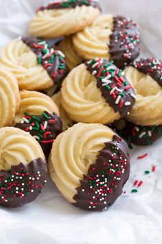 some cookies with chocolate frosting and sprinkles