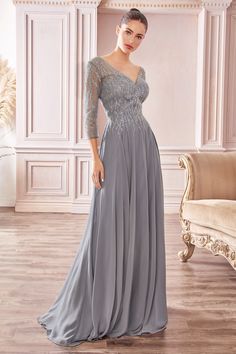 Cinderella Divine CD0171 is a Flowy chiffon a-line gown with three-quarter sleeves and trickle embellished bodice. SIZE XS SM M LG XL XXL 3XL BUST 32.5 34.5 36.5 39 42 46 50 WAIST 24 26 28 30.5 34 38 42 HIP 34.5 36.5 38.5 41 44.5 48.5 52.5 Long Sleeve Chiffon Dress, Formal Prom Dresses Long, Smoky Blue, Cinderella Divine, Prom Ball Gown, Long Sleeve Gown, Beaded Chiffon, Beautiful Evening, Chiffon Gown