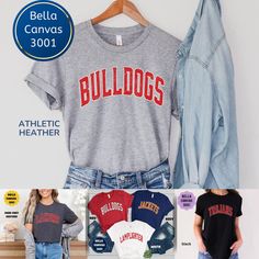 Now available on Comfort Colors Sweatshirts and Long Sleeve. Please click the link below to go there. https://www.etsy.com/listing/1533926095/custom-bulldogs-football-mascot-shirt?click_key=1c62bda2cc9642b6652d956ff07cf41cba280798%3A1533926095&click_sum=d43ade45&ref=shop_home_active_1&pro=1 If you're looking for a team mascot shirt for game day, or any day, consider this one. Thank you for stopping by. Personalization Instructions Please enter the team or mascot name. Please enter the color and Affordable Collegiate Shirt For Sports Season, Cheap Gray Tops With Team Name, Cheap T-shirt For Football Season Team Events, Affordable Shirt With Team Name For Game Day, Casual Cheap Fan Gear Shirt, Cheap College Shirt With Team Name, Cheap Collegiate Fan Gear Shirt, Cheap Team Name Fan Gear Shirt, Cheap Crew Neck T-shirt For Game Day