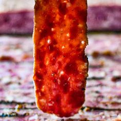 a close up of a piece of food on a table