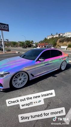 a silver car parked on the side of a road with text overlaying it that reads, check out the new insane wrap