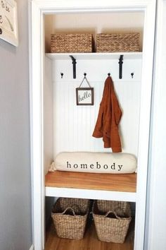 the entryway is clean and ready to be used as a mudroom for someone's home