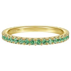 This ring is set with bright green emeralds for a slim and bright accent, perfect for celebrating a May loved one! These bands stack beautifully and also look great by themselves! Round emeralds are set 3/4 around the band. The 14 karat gold holding the stones is beautifully finished, made with your choice of 14k yellow gold, 14k white gold, or 14k rose gold. Each color of 14k gold shifts the tone and feel of the ring, making a different statement and style. Choose your statement and style! Thes Ring Making, Stamped Rings, Emerald Gemstone, Green Gemstones, Bright Green, Stacking Rings, Gemstone Colors, Or Rose, Band Rings