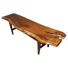 a wooden bench made out of wood with no legs and one piece of wood on top