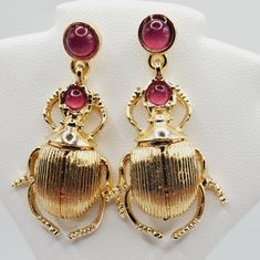 Beautiful Gold Beetle Bug Earrings! These Have A Pinkish Color Stones In Them. These Are A Stud Style And They Dangle And Move. New High Quality Made! Box A-1 Listing Vintage And New Jewelry Daily, Bundle And Save, Offers Welcome, Shipping Discount Applied! Tags: Other Items I Sell Are, Lululemon, Coach, Michael Kors, Nike, Swavorski, Givenchy, Gym Shark, Matilda Jane, Halloween Costumes, Pin Up Clothing, Retro, Mod, Vintage, Jewelry, Diamond Gold Ring, Necklace, Bracelet. 925 Sterling Silver, Handmade, Loft, Gap, White House Black Market Whbm, Free People, Navajo Trading Post, Leather, Wedding, Pets Supplies, Shipping Supplies, Poly Mailers, Thank You Stickers, Cards, Tags, Guess Bee Earring, Gold Beetle, Pin Up Clothing, Beetle Earrings, Bug Earrings, Pets Supplies, Xoxo Jewelry, Minnie Mouse Earrings, Crystal Pearl Earrings