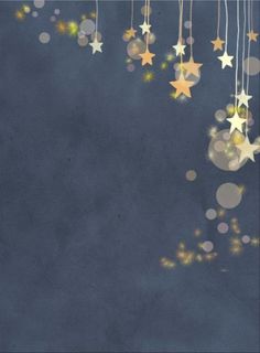 a blue background with gold stars hanging from it