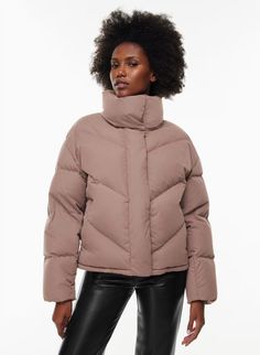 The Wilfred Cloud Puff™ is a funnel-neck goose down puffer jacket. This puffer contains 100% responsibly sourced goose down. Engineered to deliver warmth to -20°C/-4°F, this cloud-soft puffer has a boxy fit with a tall funnel neck and chevron quilting. It’s filled with 100% responsibly sourced, 700+ fill-power goose down that provides ultra-warm, lightweight insulation. This version is made with Arctic Cotton — water-repellent and wind-resistant fabric with a soft sueded face The Super Puff, Puffer Jacket Style, Puff Quilt, Down Puffer Jacket, Easy Shape, Black Lives Matter Movement, Cute Jackets, Water Repellent Fabric, The Cloud