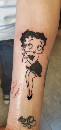 a person with a tattoo on their arm