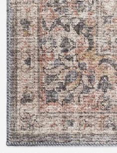 an old rug with faded colors and fringes on the bottom, in neutral tones