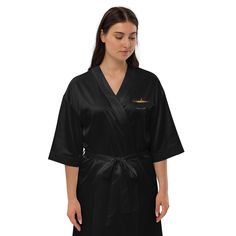 Design your well-deserved break with a soft and silky satin coat in a very special way. Once you wear it, you won't want to take it off. Thanks to its luxurious look and feel, the coat is a perfect gift for bachelorette parties, bridal parties and other intimate occasions. * Kimono style * 3/4 sleeves, length to below the knees * Side pockets and a binding belt made of self-fabric * 95% polyester-satin, 5% elastane * Raw product is sourced from Bangladesh Intimate Events, Gift For Bachelorette, Black Satin Robe, Satin Coat, Brides Babes, Mode Kimono, Kimono Style, Bachelorette Parties, White Star