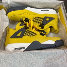 Air Jordan 4 Retro Yellow Basketball Shoes With Contrast Sole, Yellow Perforated Sneakers For Streetwear, Yellow Leather Basketball Shoes With Contrast Sole, Sporty Yellow Sneakers With Perforations, Yellow Low-top Basketball Shoes With Contrast Sole, Yellow Sporty Sneakers With Perforations, Yellow Sneakers With Perforations And Round Toe, Yellow Leather Sneakers With Perforations, Yellow Leather Basketball Shoes With Boost Midsole