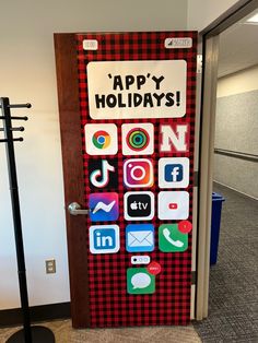 A door decorated with app photos like an iPhone and says appy holiday with a gingham wrapping background. Holiday Classroom Doors, Holiday Door Decor, Christmas Doors, Christmas Door Decorating Contest, Classroom Doors, Door Decorating Contest, Christmas Puns, Holiday Classroom, Door Decorating