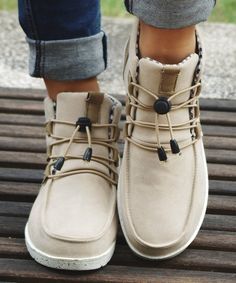 Casual Beige Synthetic Boots, Casual Beige Flat Heel Booties, Casual Beige Booties With Flat Heel, Beige Flat Heel Casual Booties, Winter Casual Faux Leather Booties, Casual Faux Leather Winter Booties, Casual Winter Faux Leather Booties, Casual Cream Faux Leather Boots, Casual Beige Booties With Round Toe