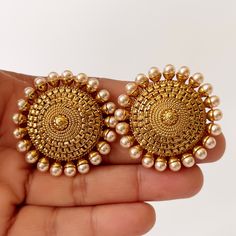 Bollywood Pearl Stud Earrings/Indian Studs/Indian Earrings/Indian Jewelry/Kundan Studs/Sabyasachi studs/Bridal Jewelry/Indian wedding This is 100% Handmade jewelry. So Color, shades, texture displayed may slightly vary from the actual product due to digital image limitations. We request you to consider these minor variations. Please expect the possibility of some slight imperfections when buying handmade jewelry. If you have any questions, please message or email us. Arrives in a gift box. Pleas Gold Round Bollywood Pearl Earrings, Gold Bollywood Style Round Pearl Earrings, Gold Bollywood Pearl Earrings, Traditional Round Clip-on Earrings For Festive Occasion, Festive Round Pearl Earrings With Intricate Design, Kundan Pearl Round Earrings In Temple Jewelry Style, Kundan Pearl Earrings For Temple Jewelry, Traditional Round Clip-on Earrings, Intricate Round Pearl Earrings For Diwali